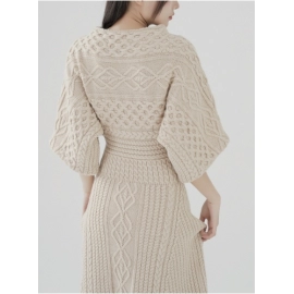 Women's early autumn dress with a high-end knitted long skirt for external wear, designed with a cinched waist bag and hip skirt length Style skirt